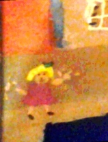 a tiny portrait of me, made when I was 5 poster paints on paper